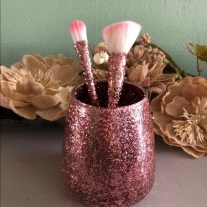Rose gold makeup brush holder.